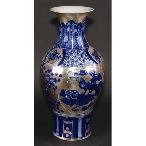 137 - A Chinese baluster vase, decorated in silver lustre and underglaze blue with flowers, clouds and pre... 