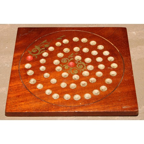 71 - A 19th century mahogany double-sided solitaire board, 15.5cm wider, marbles en suite