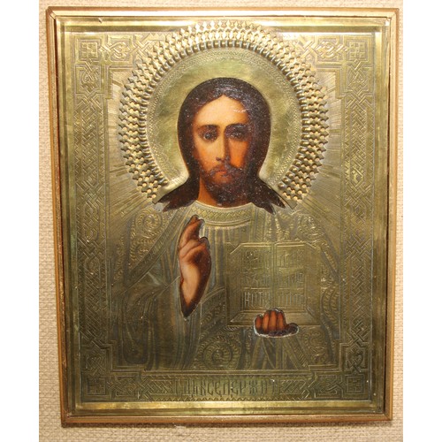 475 - An Eastern Orthodox icon, depicting Christ Pantocrator, silver-gilt coloured metal riza, 23cm x 19cm