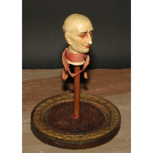 662 - The Uncanny - a French papier mache puppet head, modelled as an elderly gentleman, painted features,... 