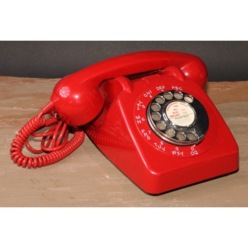 400 - A vintage GPO 706L telephone, red with chrome dial, 21cm long, c.1961