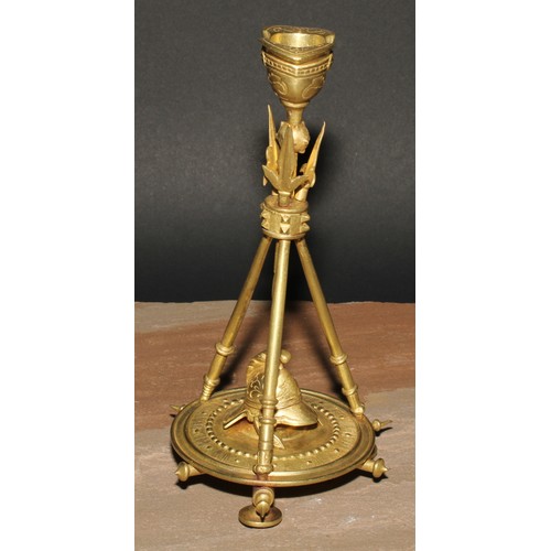 327 - A pair of French gilt bronze candlesticks, cast in the Neo-Classical taste with triumphal regalia, 2... 