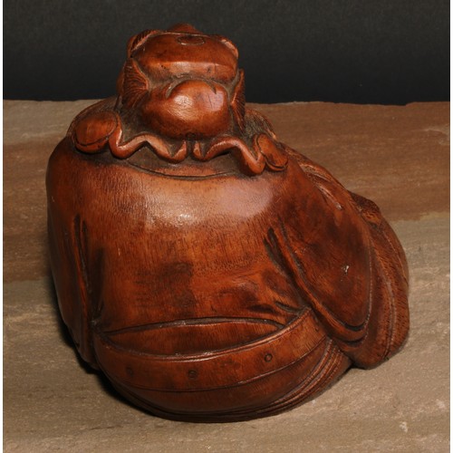 138 - A Chinese bamboo figure, carved as an elder seated on a gourd, 14.5cm high