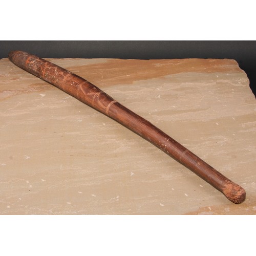 852 - Tribal Art - an Australian Aboriginal nulla nulla digging stick or waddy club, incised and picked ou... 