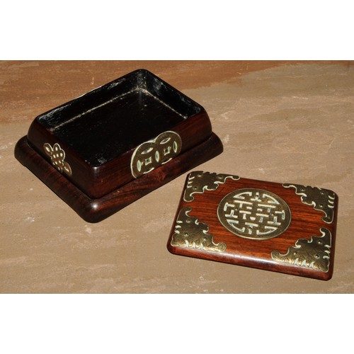 156 - A Chinese hardwood box and stand, the cover applied in brass cut-card work with bats and double happ... 