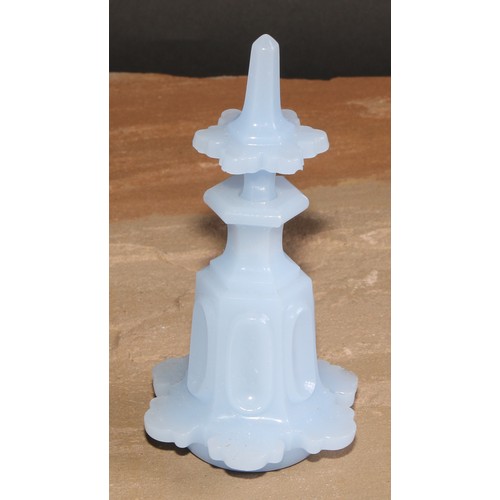 85 - A 19th century pale blue opaque glass scent bottle, moulded in the Gothic taste, 16cm high, c.1870; ... 