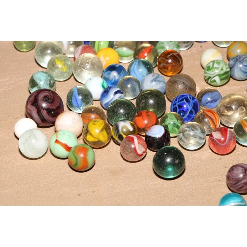 187 - A collection of 19th century and later glass marbles