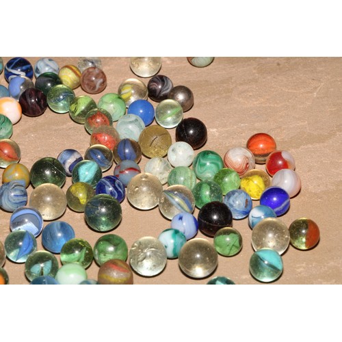 187 - A collection of 19th century and later glass marbles