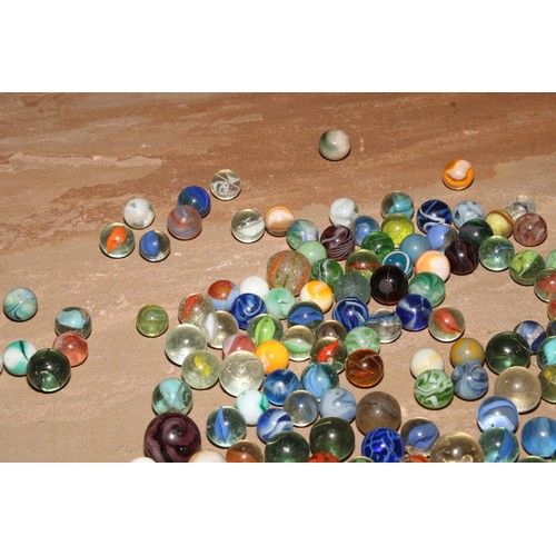 187 - A collection of 19th century and later glass marbles