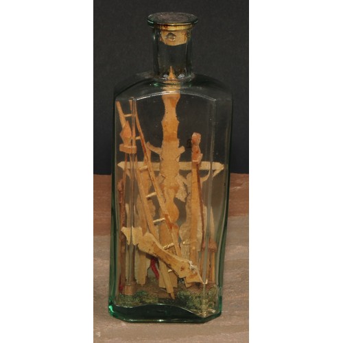 100 - A 19th century softwood and decoupage bottle diorama, in the prisoner of war and sailor folk art tra... 