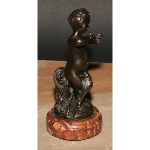 691 - After Clodion (19th century), a dark patinated bronze, of a young satyr, signed in the maquette, tur... 