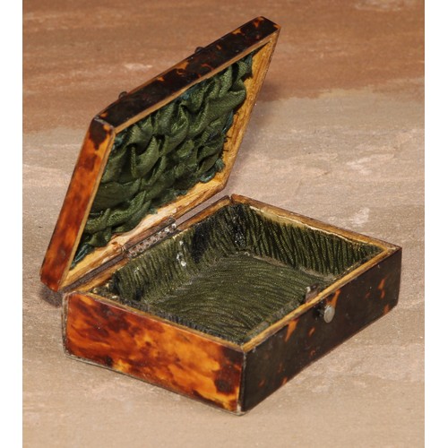 106 - A 19th century tortoiseshell rectangular casket, hinged cover decorated with cut-steel pinwork, 8cm ... 