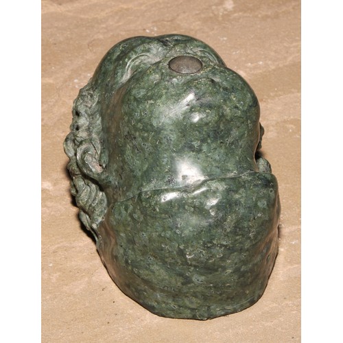 240 - A Italian Grand Tour serpentine sculptural fragment, carved as the head of zephyr, 10.5cm long, 19th... 