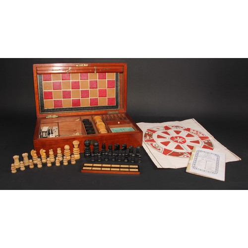 273 - A late Victorian mahogany games box, the hinged cover enclosing a comprehensive compendium, 39.5cm w... 