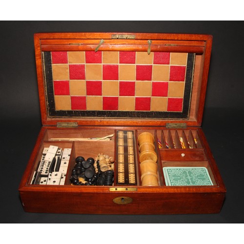 273 - A late Victorian mahogany games box, the hinged cover enclosing a comprehensive compendium, 39.5cm w... 