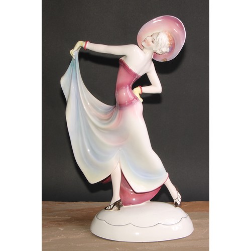 256 - A large Katzhutte Art Deco figure, of a lady dressed a la mode, oval base, printed mark, 50cm high