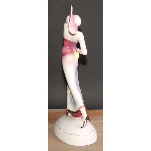 256 - A large Katzhutte Art Deco figure, of a lady dressed a la mode, oval base, printed mark, 50cm high