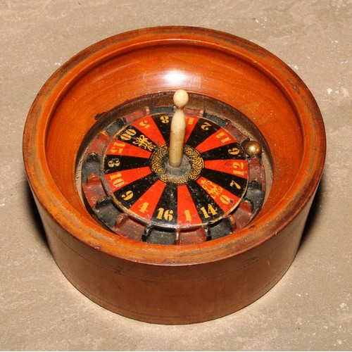 680 - Treen - an early 20th century turned boxwood miniature roulette wheel, lift-off cover with aperture,... 