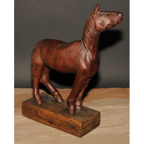 239 - A hardwood carving, of a horse, in the manner of an artist’s lay model, oak base, 33cm high overall