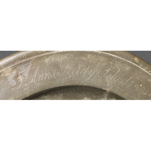 611 - London History - Charity and Education - a George/William IV pewter plate, inscribed St Ann’s Societ... 