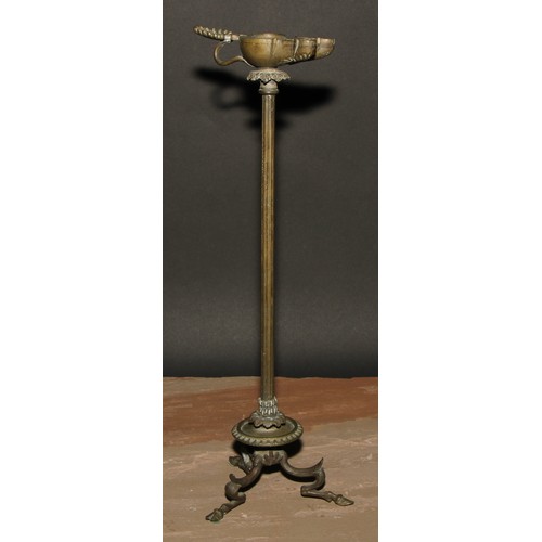 56 - A 19th century Grand Tour bronze lamp, after the Antique, tall fluted pillar, tripod base with hoof ... 
