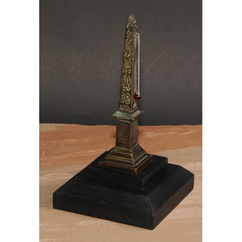 57 - A 19th century Grand Tour bronze obelisk desk thermometer, stepped square ebonised base, 23cm high