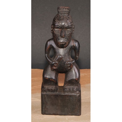 858 - Tribal Art and the Eclectic Interior - a Maori figure, 21.5cm high, New Zealand