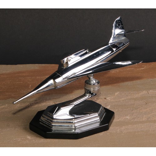 430 - An Art Deco style chrome novelty table lighter, as a jet aeroplane, lozenge shaped base, 24cm long