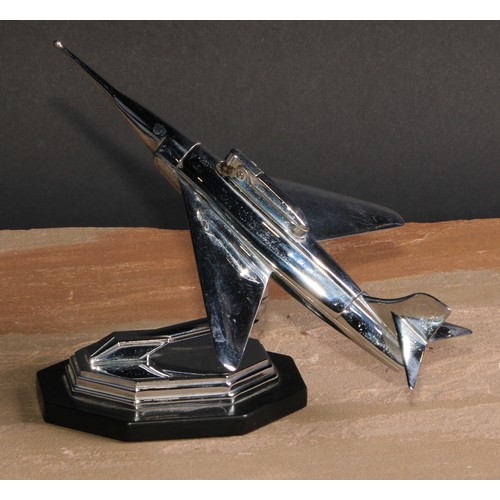 430 - An Art Deco style chrome novelty table lighter, as a jet aeroplane, lozenge shaped base, 24cm long