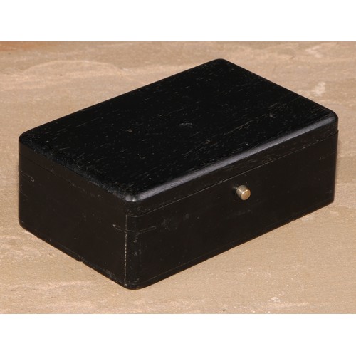 773 - Natural History - a collection of fossilized shark's teeth, the ebony box 10.5cm wide