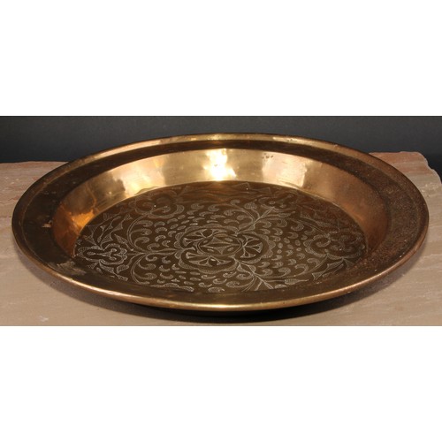 126 - A brass alms dish, chased with scrolling leaves, 45cm diam