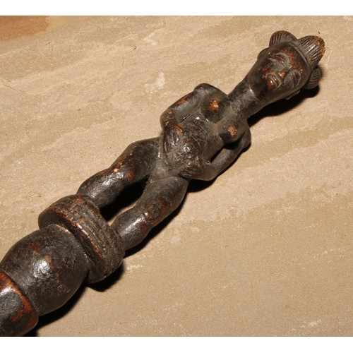 850 - Tribal Art - an African staff or house marker, carved with a female figure, 48cm high