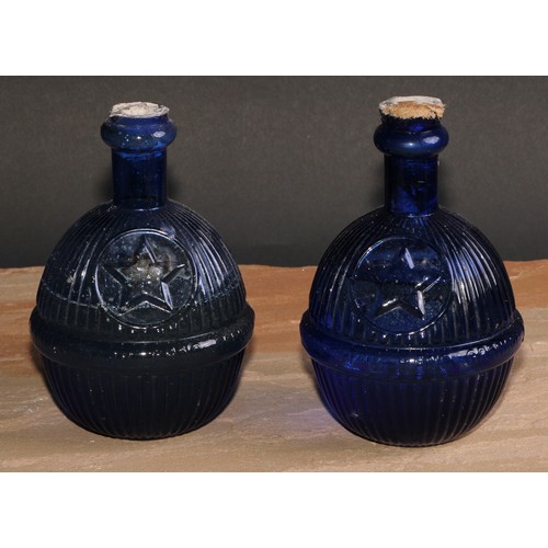 382 - A Victorian blue glass Star Hardens Hand Grenade Fire Extinguisher, 17cm high; another (2)