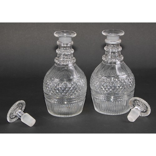 314 - A pair of 19th century hobnail-cut mallet shaped decanters, mushroom stoppers, three neck rings, 20.... 