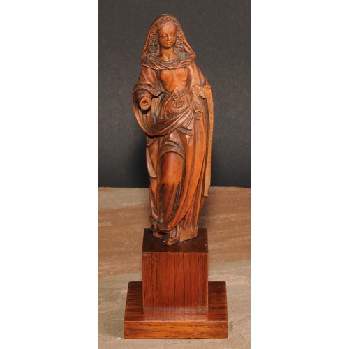 414 - An 18th century boxwood figure, carved as the Madonna, 15cm high, later oak plinth, 20cm high overal... 