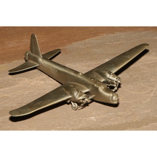 203 - A die cast model of a World War II Wellington Bomber, 13cm long; another model aeroplane; a model ca... 