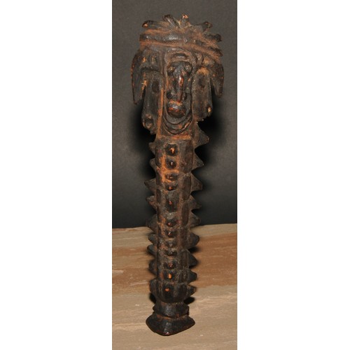 828 - Tribal Art - a carved figural staff or votive, 26cm long