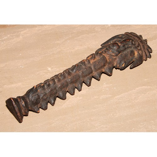 828 - Tribal Art - a carved figural staff or votive, 26cm long