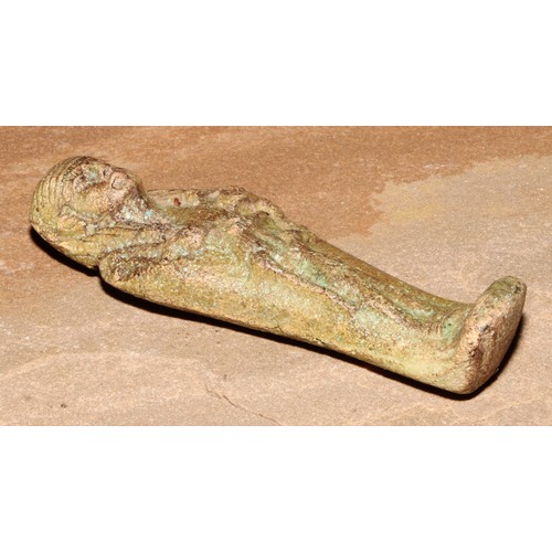 864 - Antiquities - an Ancient Egyptian faience shabti, 9cm long, collector's display stand