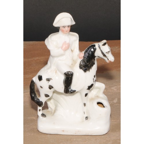 259 - A late 19th century German porcelain inkwell, of fairing type, modelled as Napoleon Bonaparte on hor... 