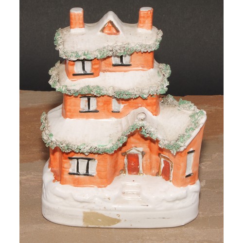 101 - A 19th century Staffordshire pottery novelty money box or bank, modelled as a cottage, 19cm high, c.... 