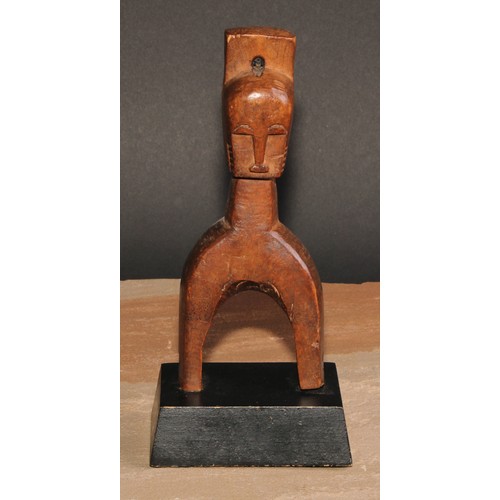 826 - Tribal Art - a Bambara heddle pulley, carved as a janus figure, 18.5cm high, Mali, West Africa, coll... 