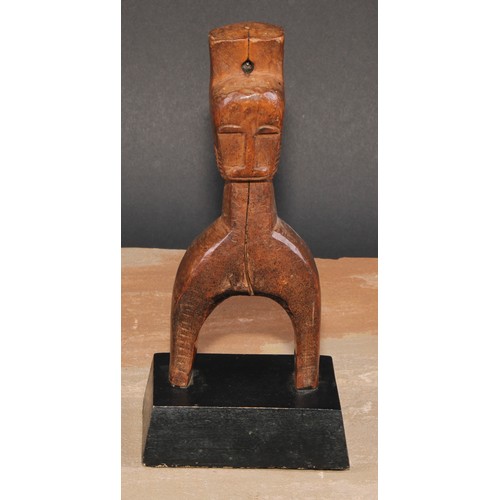 826 - Tribal Art - a Bambara heddle pulley, carved as a janus figure, 18.5cm high, Mali, West Africa, coll... 