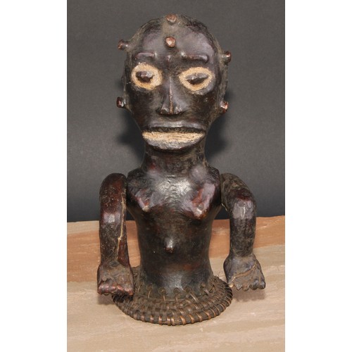 855 - Tribal Art - an Ekoi leather figural headdress, probably depicting an ancestor, fibre trim to base, ... 