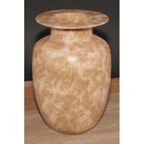 483 - An Egyptian alabaster ovoid vessel, 21.5cm high