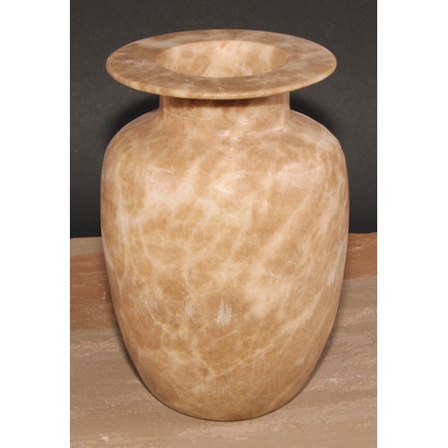 483 - An Egyptian alabaster ovoid vessel, 21.5cm high