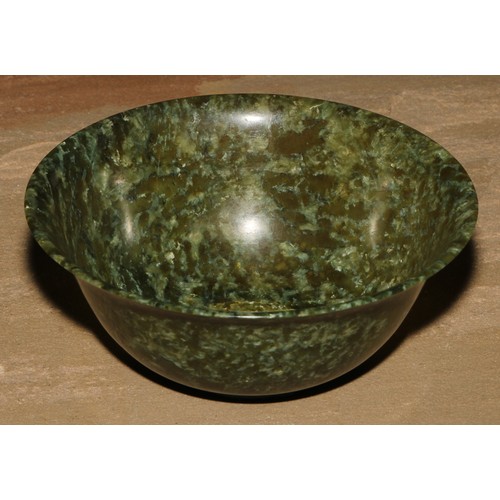 180 - A Chinese spinach jade circular bowl, 132cm diam