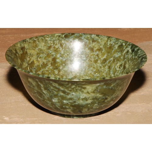 180 - A Chinese spinach jade circular bowl, 132cm diam