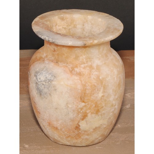 482 - An Egyptian alabaster ovoid vessel, 13cm high