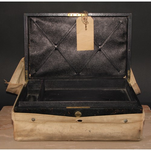 394 - A Victorian morocco leather rectangular document or despatch box, hinged cover with flush brass camp... 